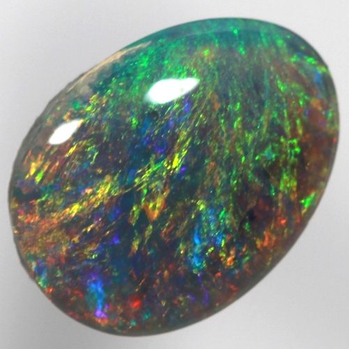 SOLID SEMI BLACK OPAL Pinfire pattern of orange green and blue